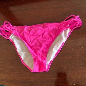 GOING TO GOODWILL APRIL 30– 
PINK Victoria Secret bikini bottom crisscross sides